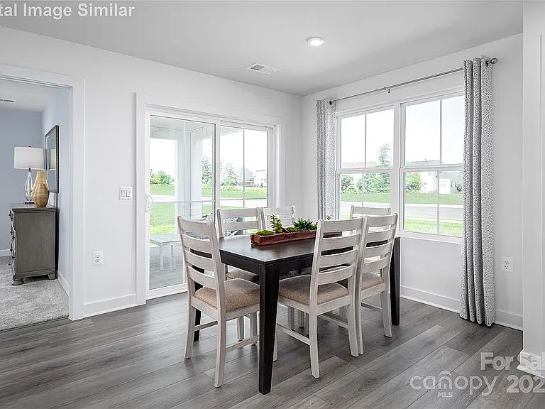 Photos are of the model home: The same floor plan and similar finishes as 107 Jameson Park Dr. #5
