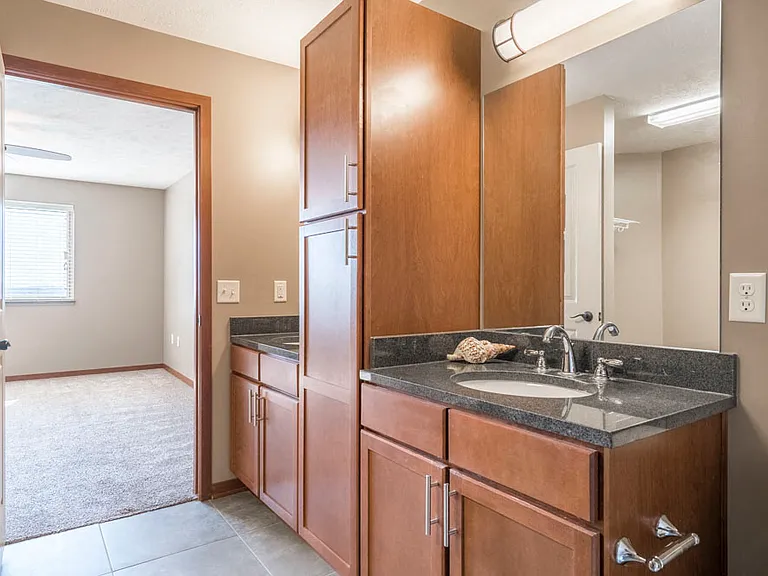 Select layouts include dual sinks in the primary bath.