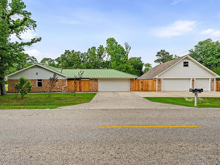 Driveway is shared with a separate home on the backside of the property. Home is completely private with private backyard and entry