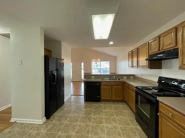 Fully equipped kitchen with sink garbage disposal.