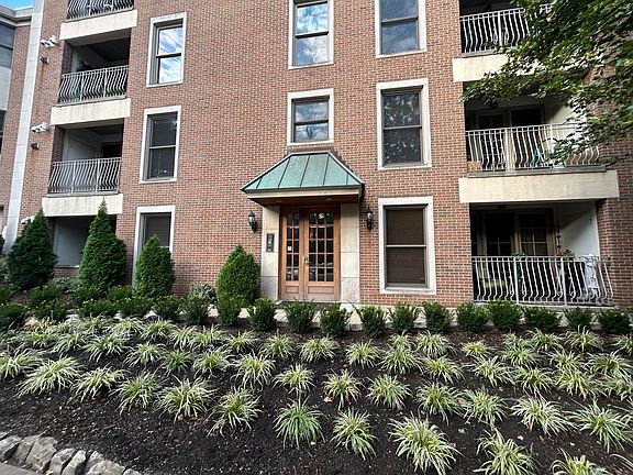Suite 402 building entrance w/ intercom for guests and deliveries. (Call box programed to call tenants cell phone)