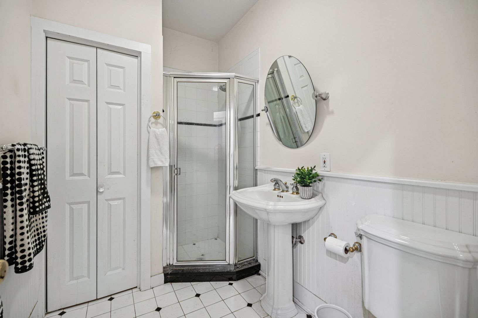 Full bathroom situated on the first floor for added convenience.