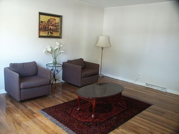 Living room with gleaming hardwood floor