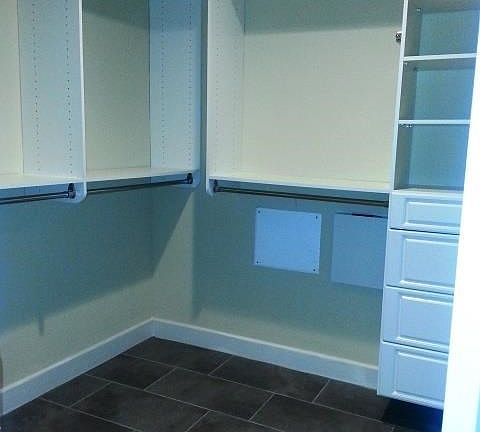 Master bedroom closet has organizers