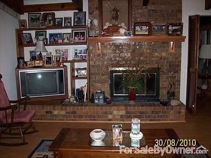 Wonderful living room : A great double fireplace that opens into the den. So cozy.
