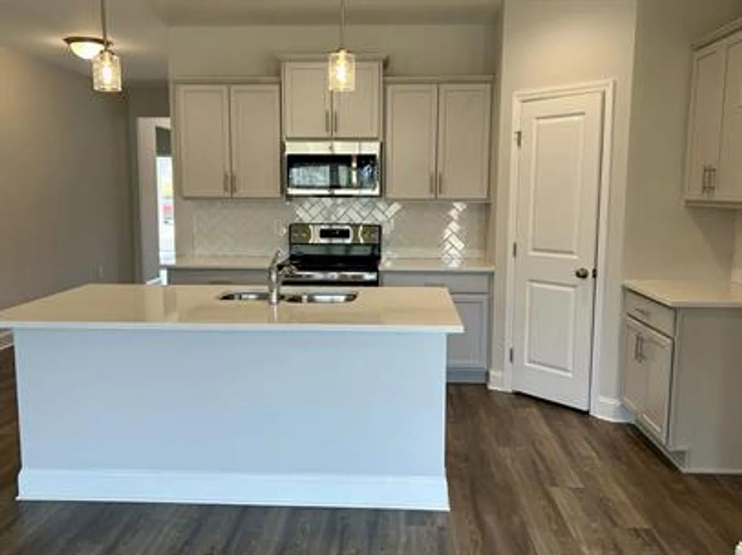 Relax & Unwind in This Peaceful 4 Bedroom Home — Photo 3