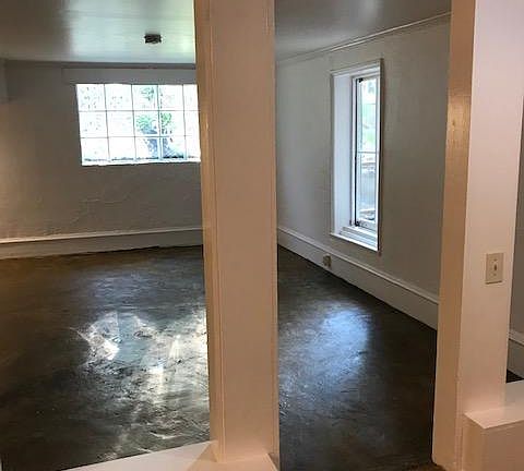 Living room is just to the right of the entrance.