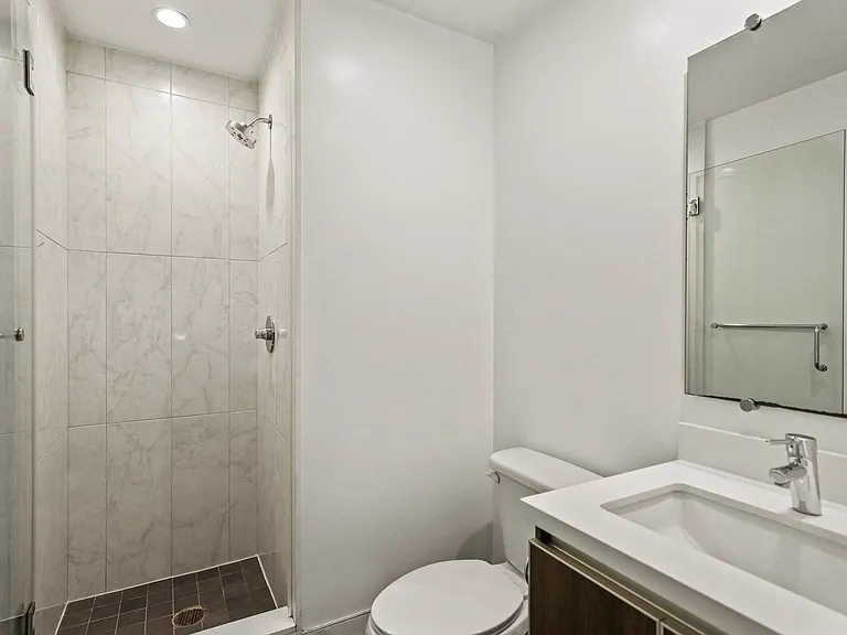 Bathroom with Walk-In Shower and Glass Door