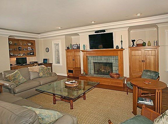 Hardwood Flooring with Hand Woven Jute Carpeting.