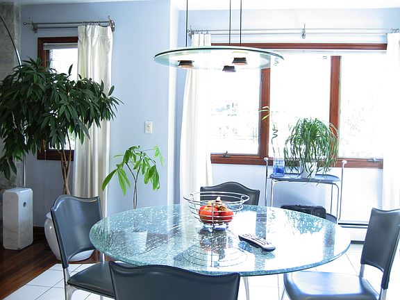 breakfast area overlooking backyard and pool