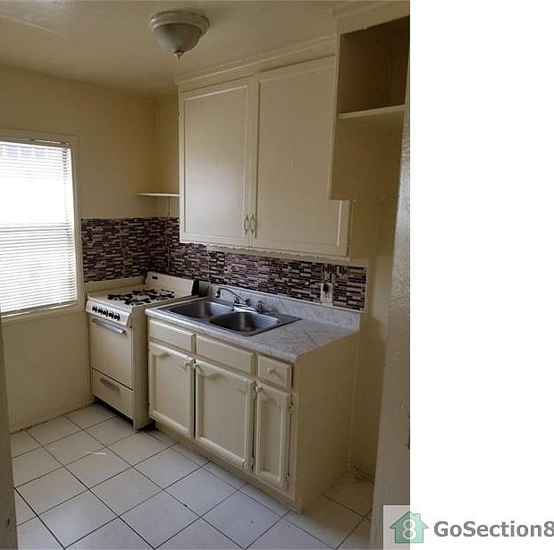 1st image of 10019 S Hoover St APT 4