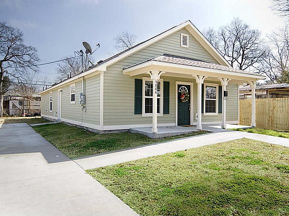 A great driveway and charming porch entry.