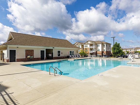 Soak up the sun or unwind with a refreshing swim in our sparkling community poolyour oasis just steps from home.
