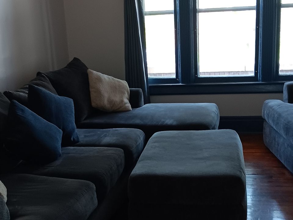 Livingroom, view of front windows. Furniture is available if desired?