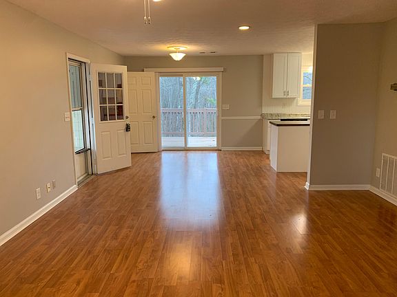 Living Room looking in to Dining Area, Kitchen & Deck