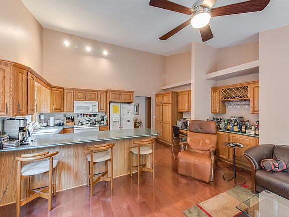 Built in desk, pantry and wine bar in kitchen.