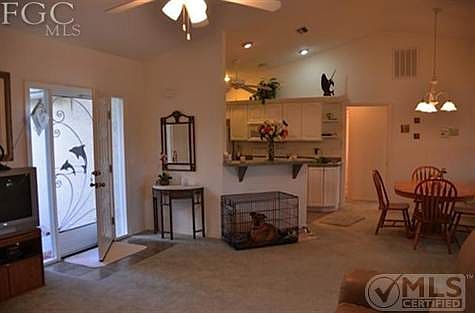 Front entry to home with great entertaining room.