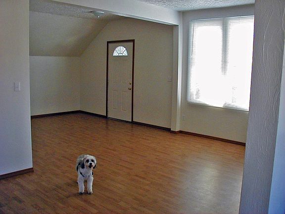The kitchen, dining area and living room create a open, chee