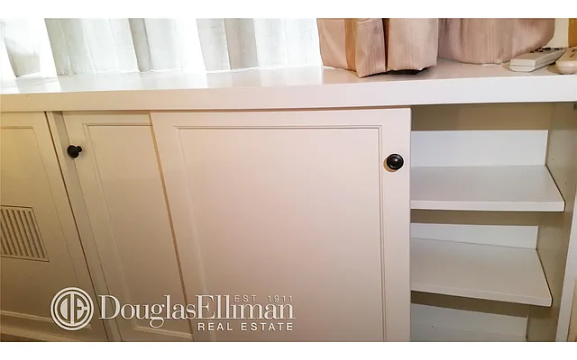 Sold by Douglas Elliman | media 13