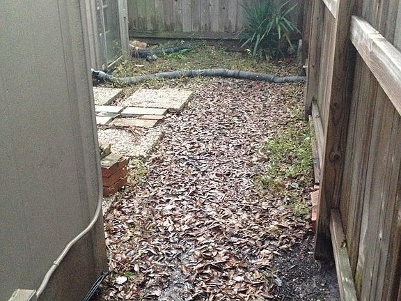 Quite City Living
						:
						This ground level unit is surrounded by lush, native landscape & a large fence.