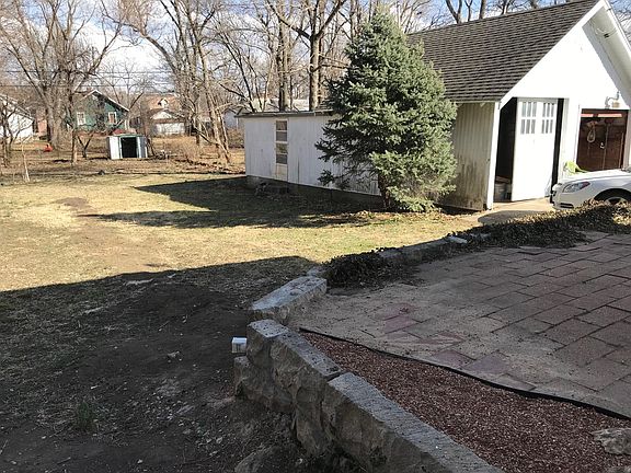 Back yard, garden shed, double deep garage, patio