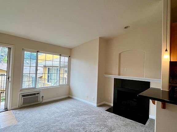 Living room featuring warm gas fireplace _ perfect for relaxing after a long day