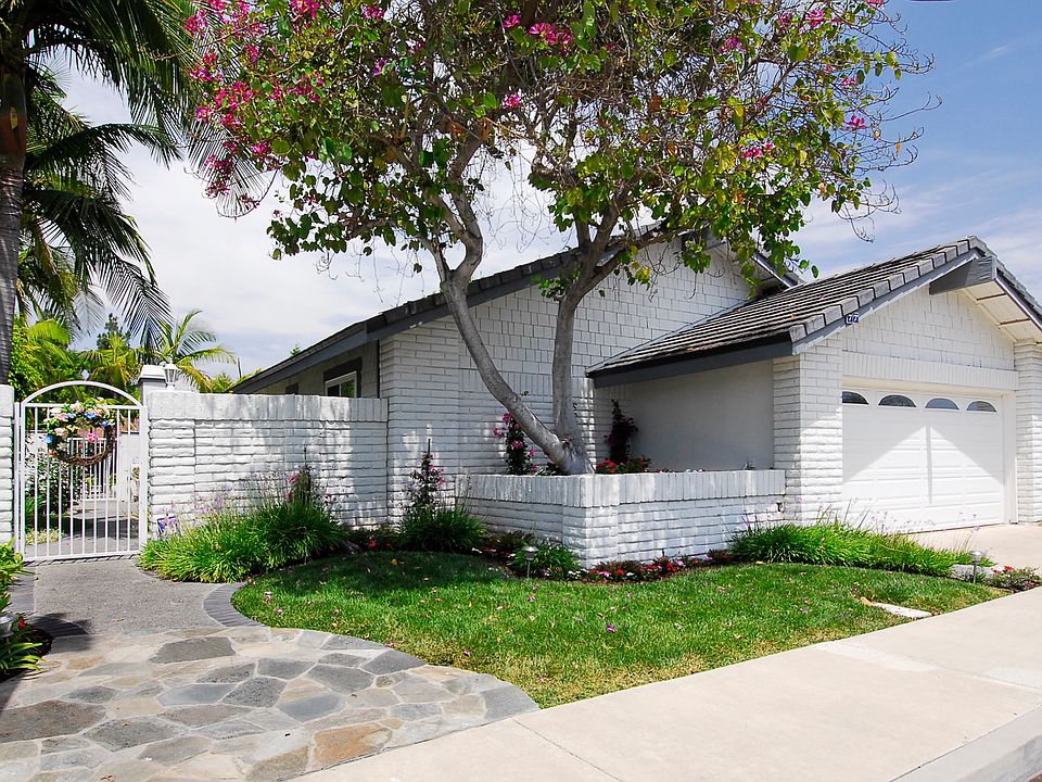 Stunning white brick with flagstone entry
