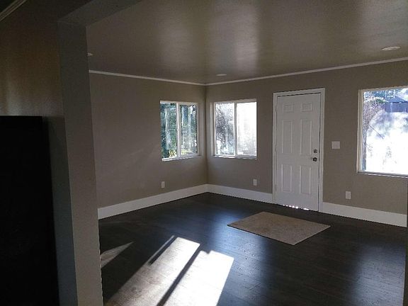 Living room with brand new hardwood flooring