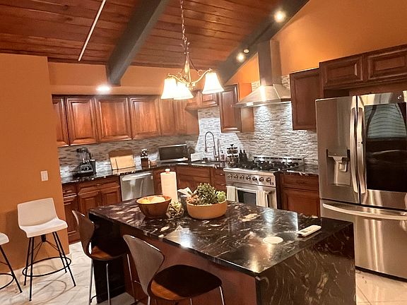 Kitchen with waterfall island