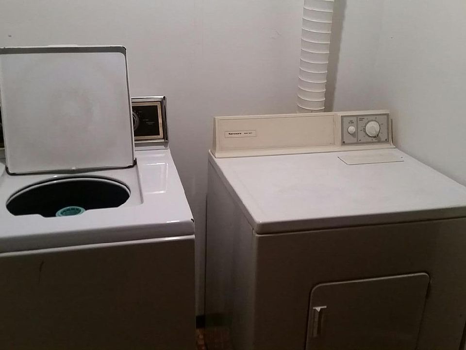 utility room with laundry,lower level off of kitchen