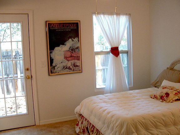 Master bedroom with french door out to very private patio