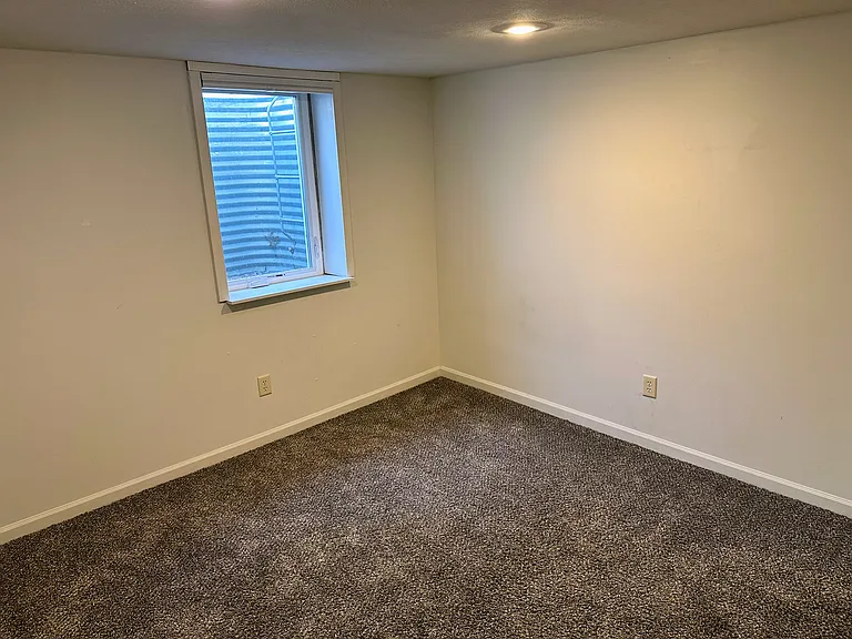 Basement bedroom with emergency egress