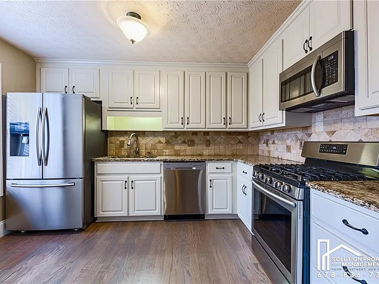 4929 Baker Plantation Way — Photo 10