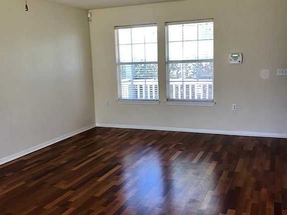 Living room with real hardwood flooring