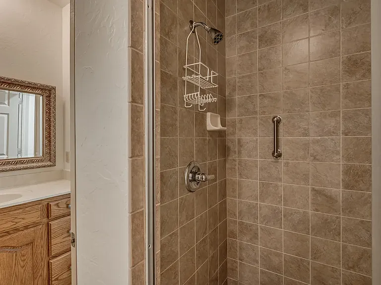 Master Bathroom with Walk-in Shower and glass door.