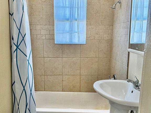 Bright and modern bathroom with lots of storage.