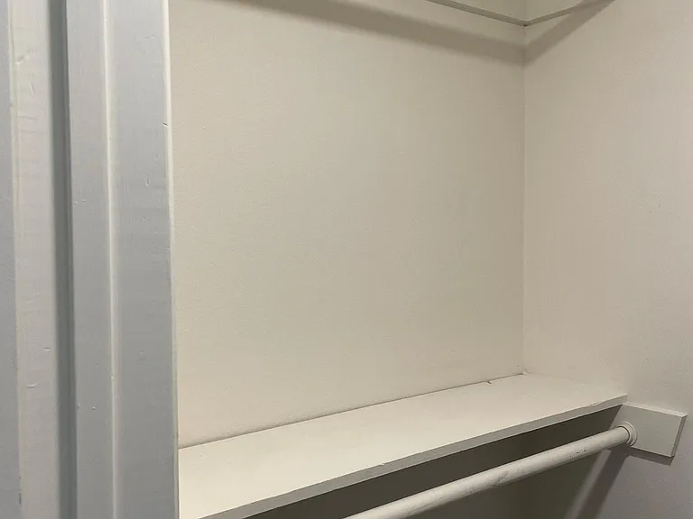 Bedroom 2 - one side of Walk in Closet
