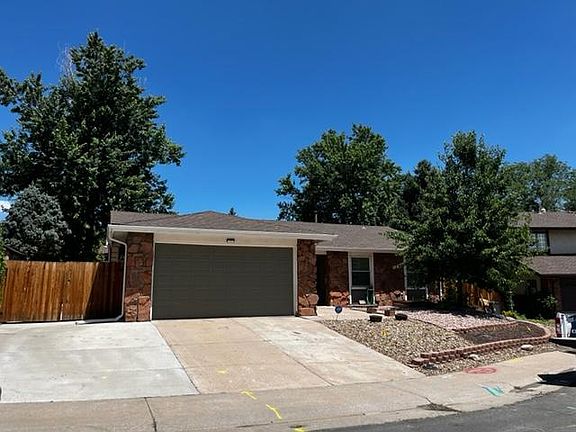 Front of home from street with extra parking space