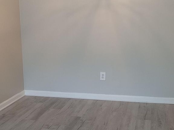 Spacious dining room with new fixture