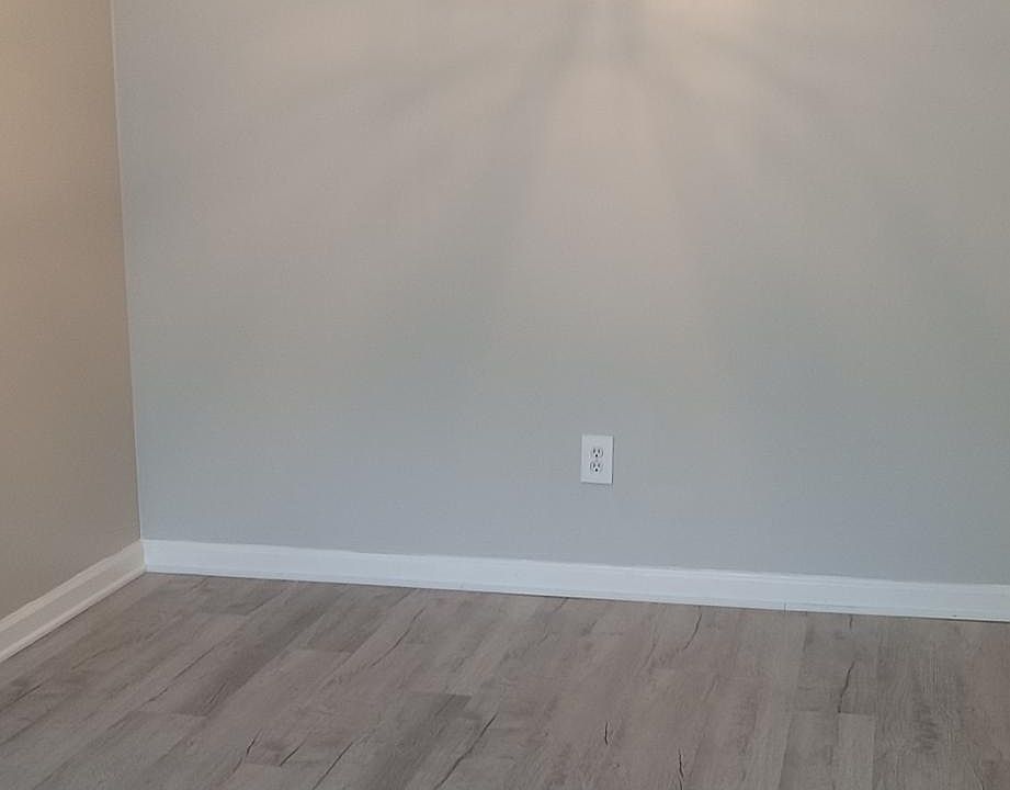 Spacious dining room with new fixture