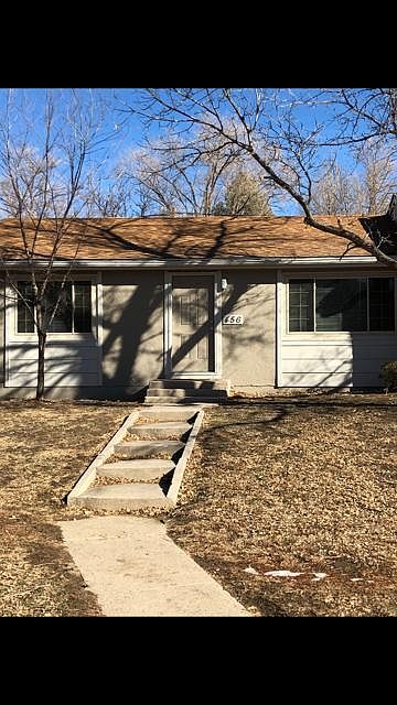 Front of newly painted building.