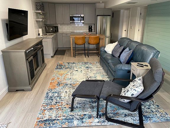 Main living area with kitchen in back.