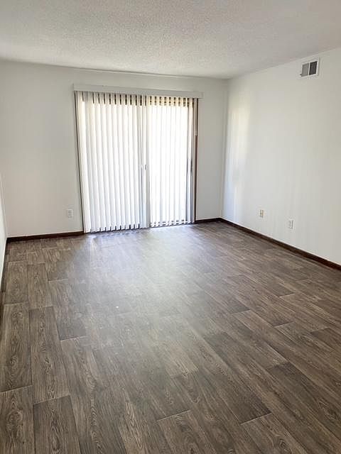 View of family room and private 2nd floor balcony.