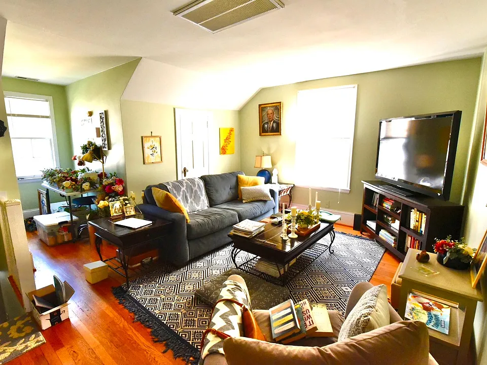 This the great room which everything centers around, a very large space with the entrance steps you can see to the left, a very large closet straight ahead ( lots of storage!) and the bathroom, kitchen and bedroom hall leading from this room.