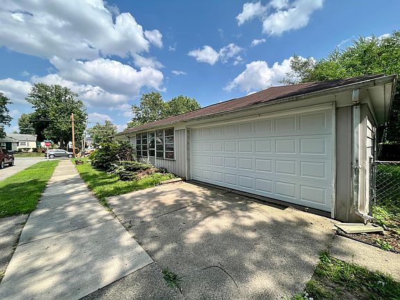 Attached 2-Car Garage and 3-season room