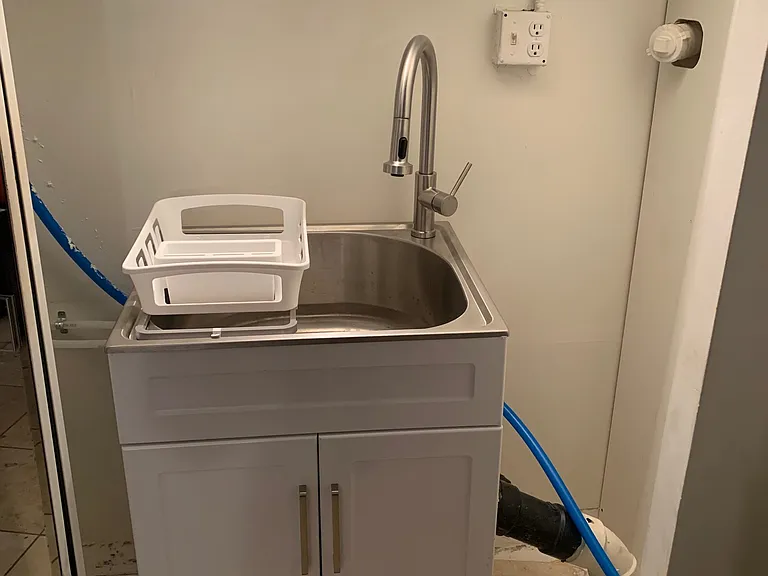 sink suitable for dishes or washing clothing It is in a mirrored closet so you can close it if you like...