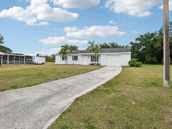 4th image of 671 SW Old Briar Avenue