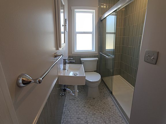 Remodeled bathroom with walk-in shower