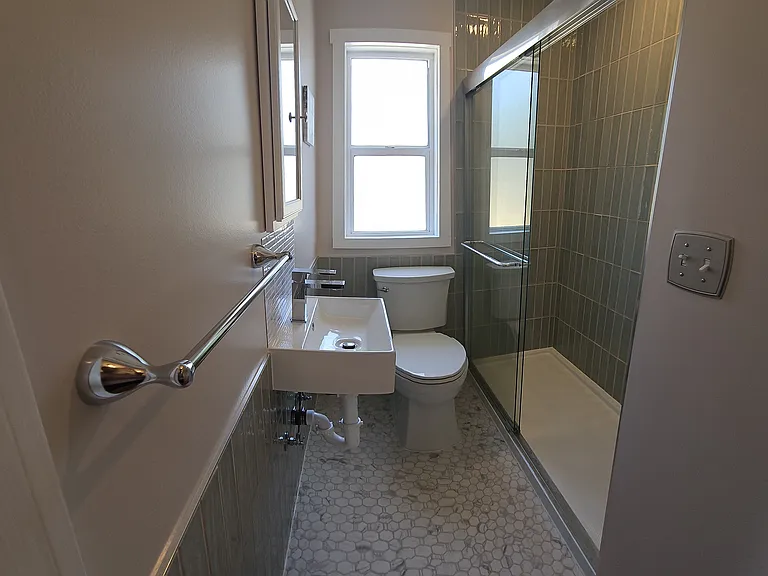 Remodeled bathroom with walk-in shower