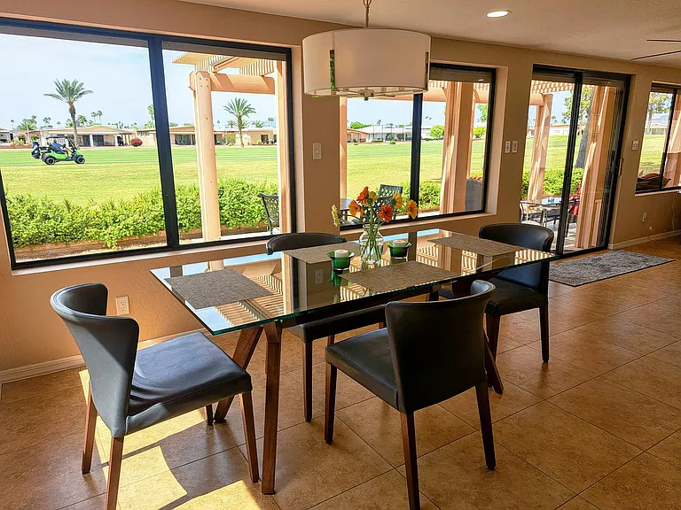 Watch the golfers while dining!